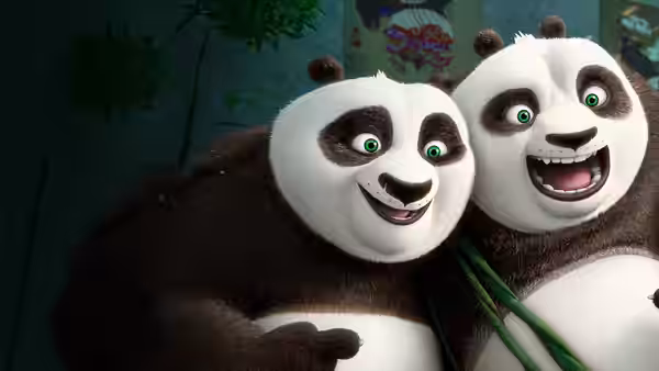 Po and Li smile together among bamboo