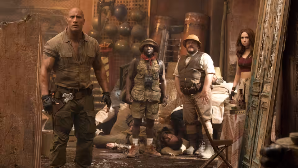 Bravestone, Mouse, and Oberon stand among fallen men in a crowded market