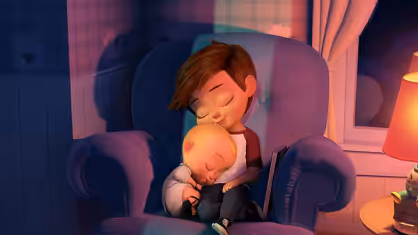 Tim cuddles sleeping Boss Baby in an armchair beside a lamp