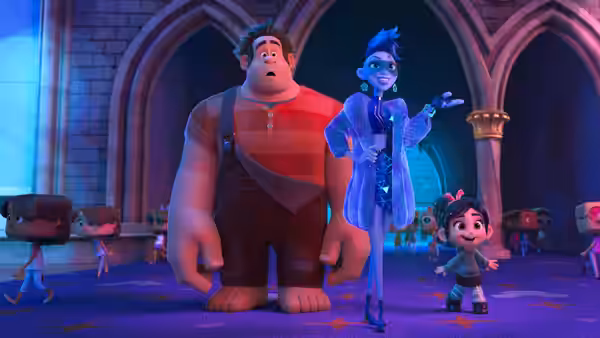 Ralph and Vanellope stand beside a blue-clad princess in a castle corridor