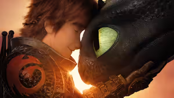 Hiccup (Jay Baruchel) rests his forehead against Toothless in the sunset