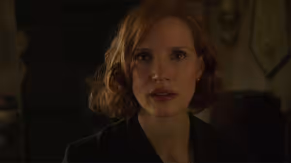 Beverly Marsh (Jessica Chastain) looks ahead inside a dim room