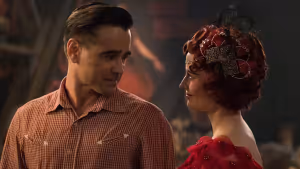 Holt Farrier (Colin Farrell) and Colette Marchant (Eva Green) exchange a glance
