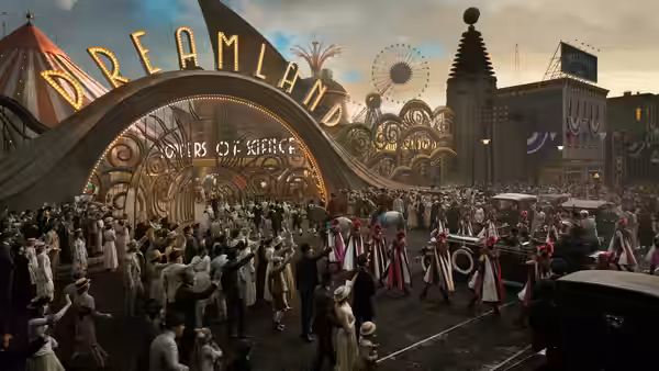A crowd gathers outside Dreamland as performers parade beneath the amusement park entrance