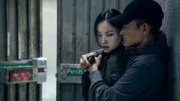 Poon Shing Fung (Andy Lau) holds Pong Ling (Ni Ni) close inside a wooden structure