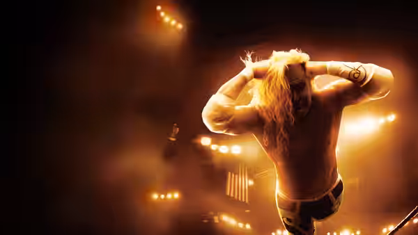 Randy (Mickey Rourke) standing with hands on his head in the ring