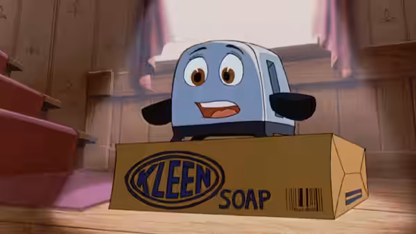 Toaster peeks out of a KLEEN soap box in a sunlit bedroom