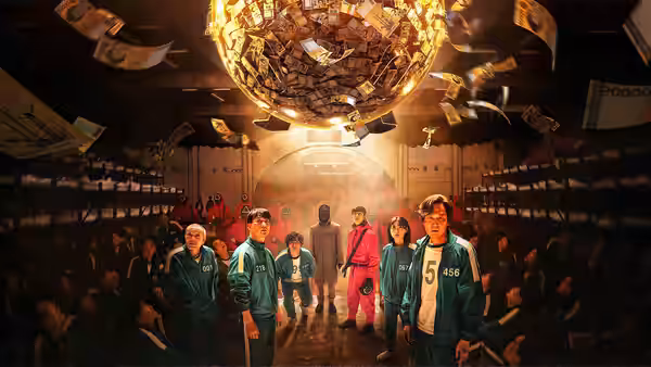 Seong Gi-hun and players stand beneath a giant glowing sphere spilling banknotes in a vast hall