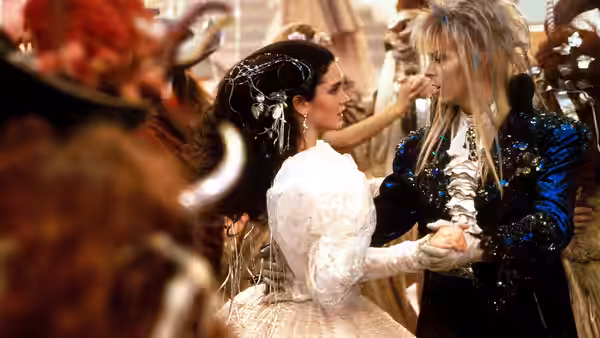 Sarah (Jennifer Connelly) and Jareth (David Bowie) dancing at a ball