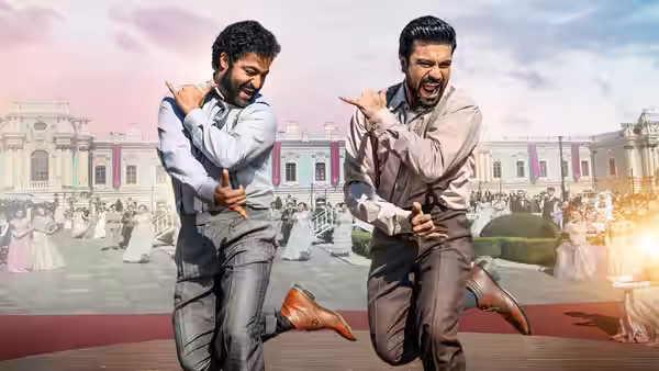 Komaram Bheem (N.T. Rama Rao Jr.) and Alluri Sitarama Raju (Ram Charan) dance in a palace courtyard