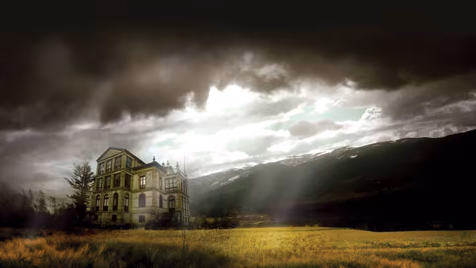 An abandoned-looking manor stands alone in a field beneath a stormy sky