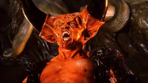 Lord of Darkness (Tim Curry) roars beneath his massive black horns