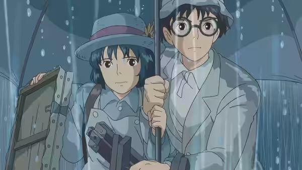 Jiro Horikoshi and Naoko Satomi stand together under an umbrella in the rain