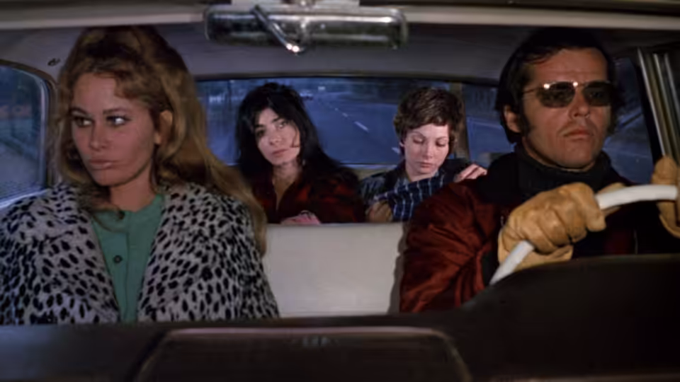 Robert Dupea (Jack Nicholson) drives with Rayette (Karen Black) beside him