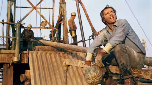 Robert Dupea (Jack Nicholson) sits on an oil rig structure