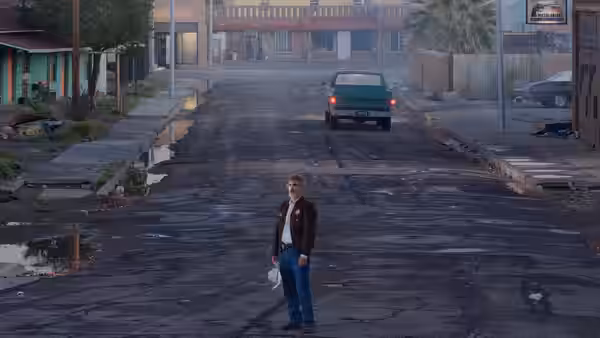 A man stands alone on a deserted street holding papers