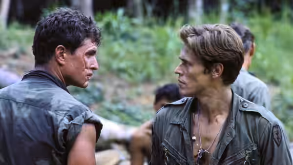 Chris Taylor and Sergeant Barnes face each other in tense jungle confrontation