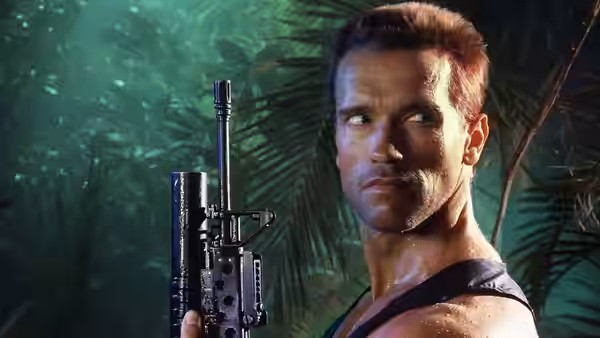 Dutch (Arnold Schwarzenegger) holding a large gun in the jungle
