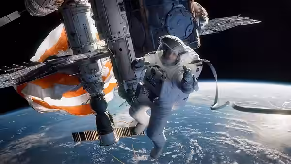 Ryan Stone (Sandra Bullock) floating near the International Space Station in orbit