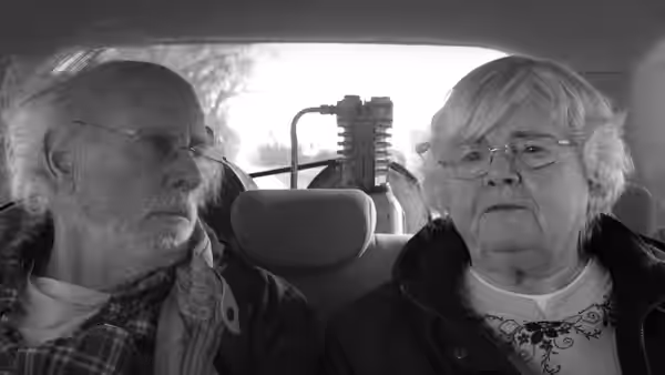 Woody Grant (Bruce Dern) and Kate Grant (June Squibb) sit together inside a car