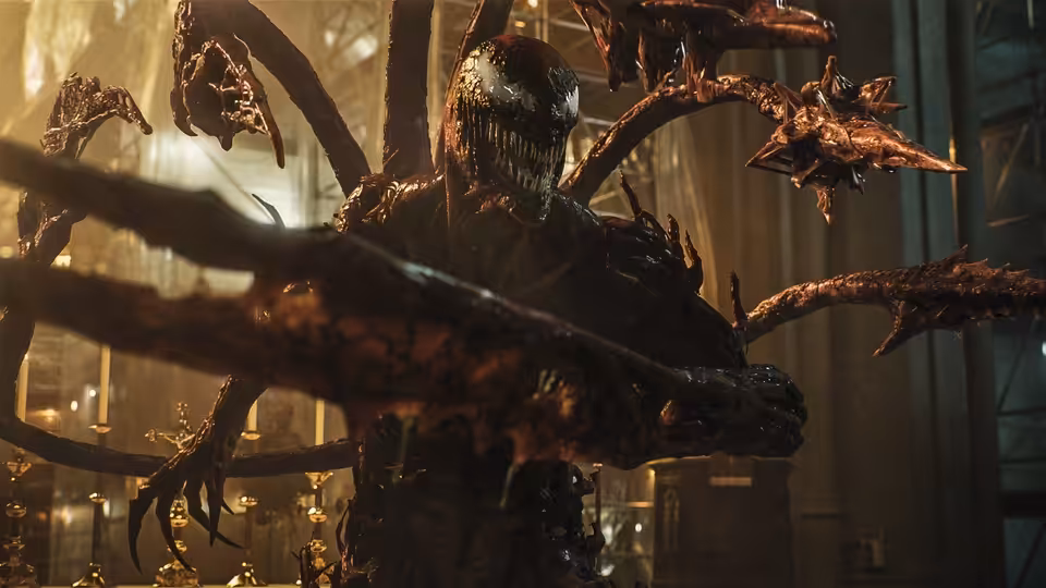 Carnage spreads his tendrils through a warmly lit interior