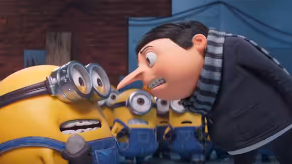 Gru (Steve Carell) leans toward a Minion (Pierre Coffin) as others watch