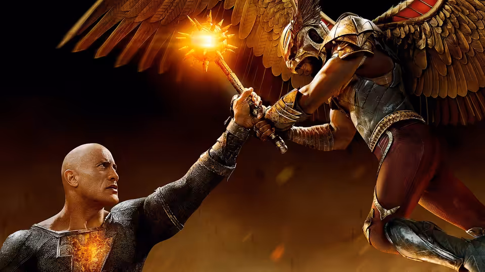 Black Adam clashes with Hawkman, their weapons meeting beneath Hawkman’s spread wings