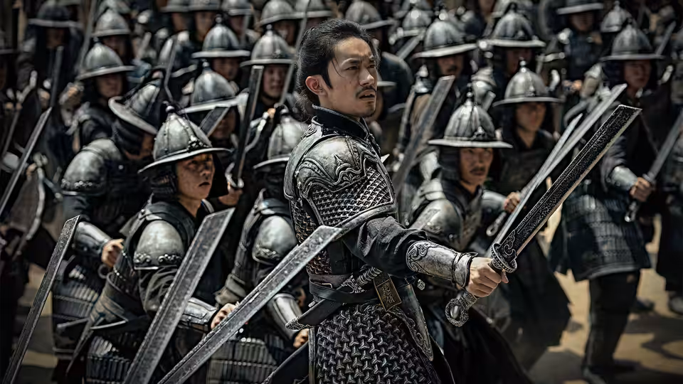 An armored commander turns with his sword amid ranks of soldiers