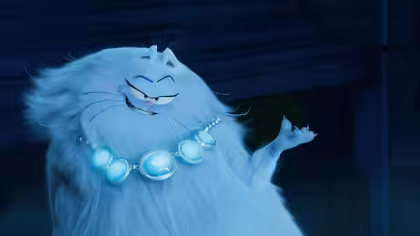 Jinx, a fluffy white cat wearing a glowing blue necklace, gestures in a dark room