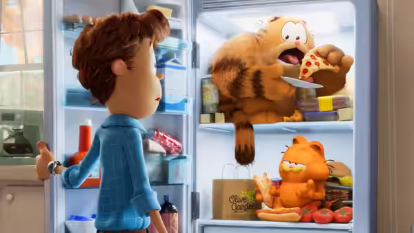 Jon watches Garfield raid the open refrigerator while Odie waits among the food
