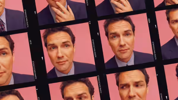 Norm Macdonald (as himself) appears in a grid of portraits against a pink backdrop