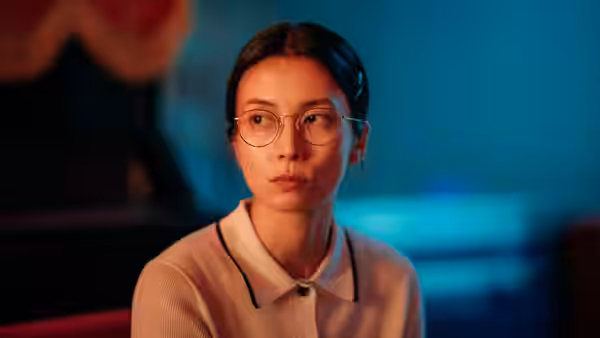 Yui Katakura (Kō Shibasaki) looks toward someone beside her