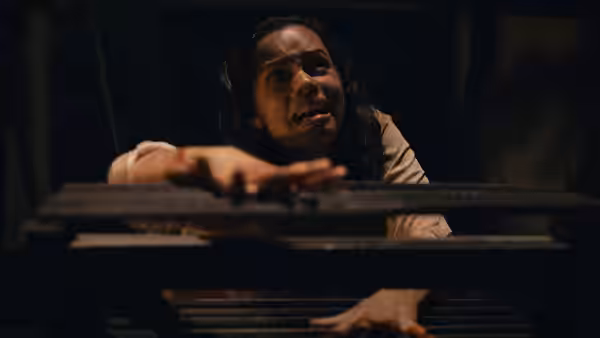 Tess (Georgina Campbell) reaches forward with a fearful expression