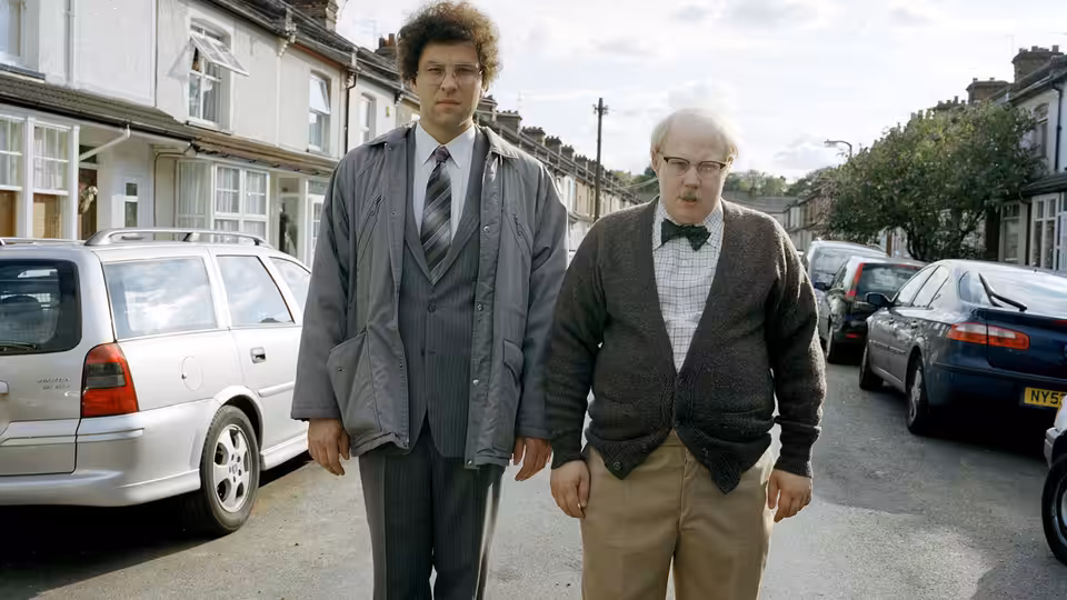 Lou (David Walliams) and Andy (Matt Lucas) walk along a residential street
