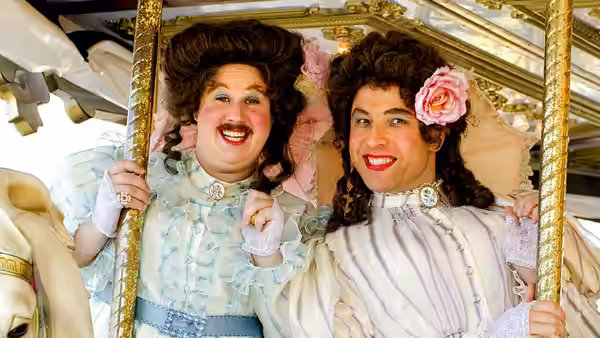 Emily Howard (David Walliams) and Florence Rose (Matt Lucas) pose in ornate dresses