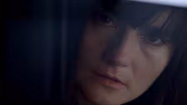Charlotte (Shirley Henderson) looks down with a troubled expression