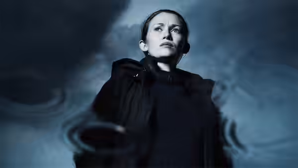 Sarah Linden (Mireille Enos) looks upward as she stands in water