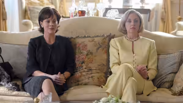 Cherie Blair (Helen McCrory) and Hillary Clinton (Hope Davis) sit together on a sofa