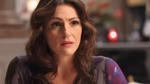 Rachel Bailey (Suranne Jones) looks ahead while sitting indoors