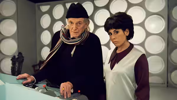 William Hartnell (David Bradley) and Verity Lambert (Jessica Raine) stand at the TARDIS console
