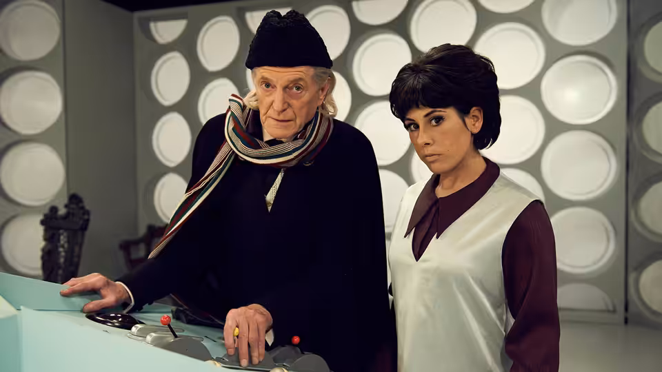 William Hartnell (David Bradley) and Verity Lambert (Jessica Raine) stand at the TARDIS console