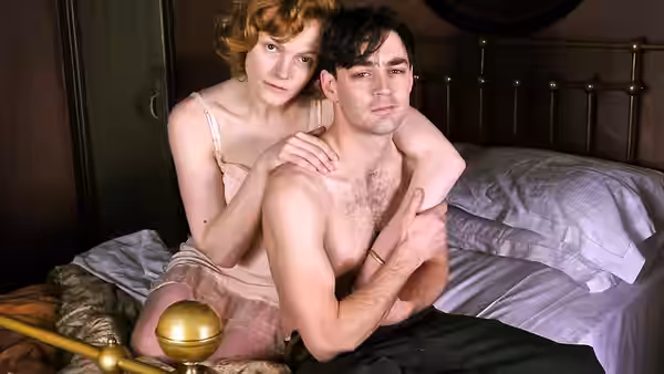 Alice Aisgill (Maxine Peake) embraces Joe Lampton (Matthew McNulty) on a bed