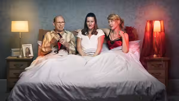 Sally (Catherine Shepherd), Nigel (Julian Barratt) and Emma (Julia Davis) sit together in bed