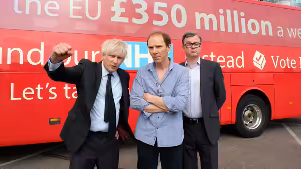 Boris Johnson (Richard Goulding) and Dominic Cummings (Benedict Cumberbatch) stand beside a Vote Leave bus