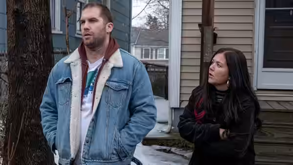 Neil O'Connor (Alex Bonifer) stands outside with Patty O'Connor (Mary Hollis Inboden)