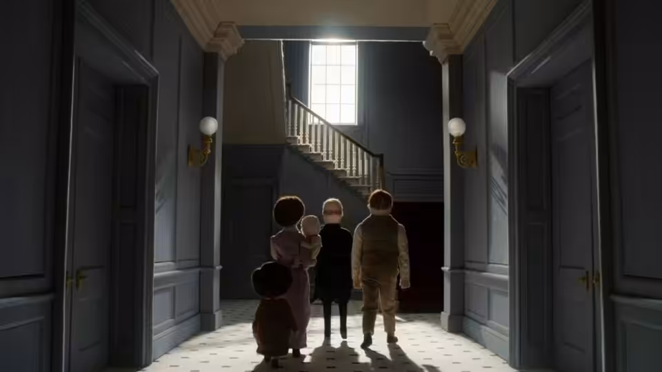 A family enters a grand hallway and faces the staircase beneath a tall window