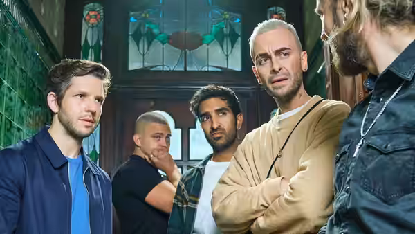 Four men gather beneath stained glass while another faces them