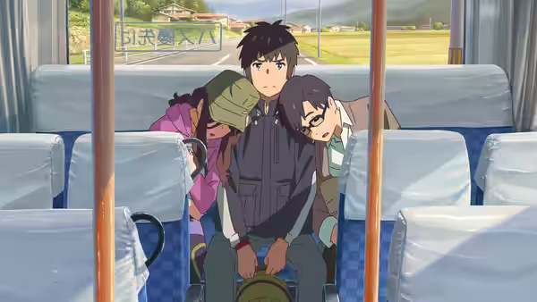 Taki Tachibana (Ryunosuke Kamiki) sits inside a bus with other passengers looking ahead