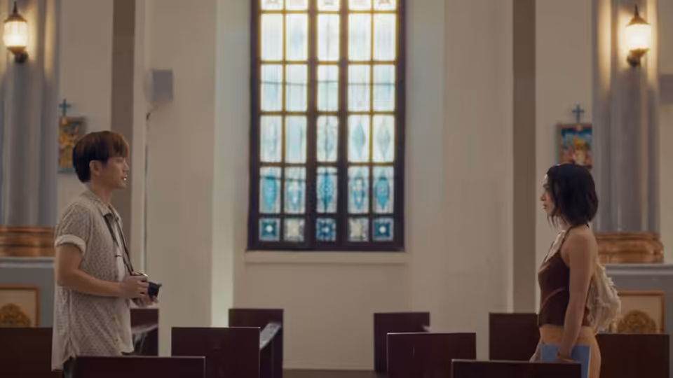 Apollo (Joshua Garcia) and Luna (Julia Barretto) face each other inside a church