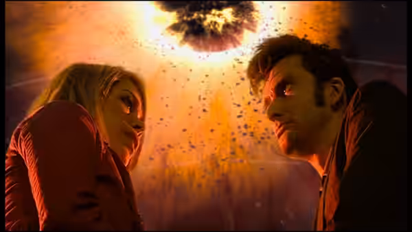 The Doctor (David Tennant) and Rose Tyler (Billie Piper) look up beneath a fiery cosmic opening